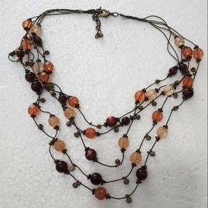 Vintage 18 inch bead necklace w/extender, brown/cream/rust tone beads on rope
